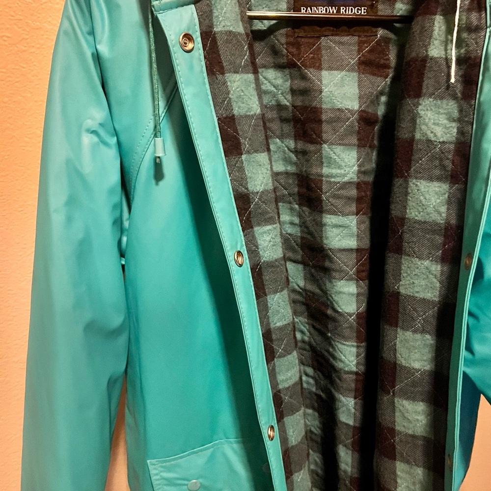 Vintage Rainbow Ridge Blue Raincoat with Hood and Water-Resistant Material